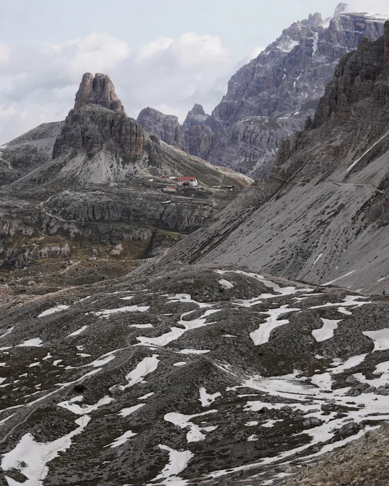 Panoramic view of the Tre Cime di Lavaredo and surrounding hiking trails in the Italian Dolomites.