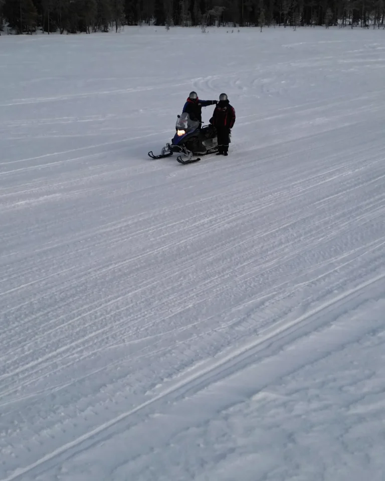 Snowmobile tour with Vmax Rentals through the winter landscape of Levi, Lapland.