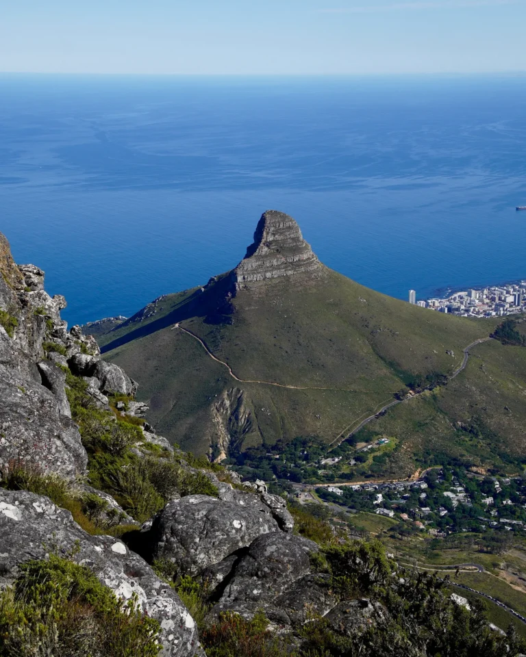 Clear panoramic view from Table Mountain summit looking towards Lions Head in Cape Town.