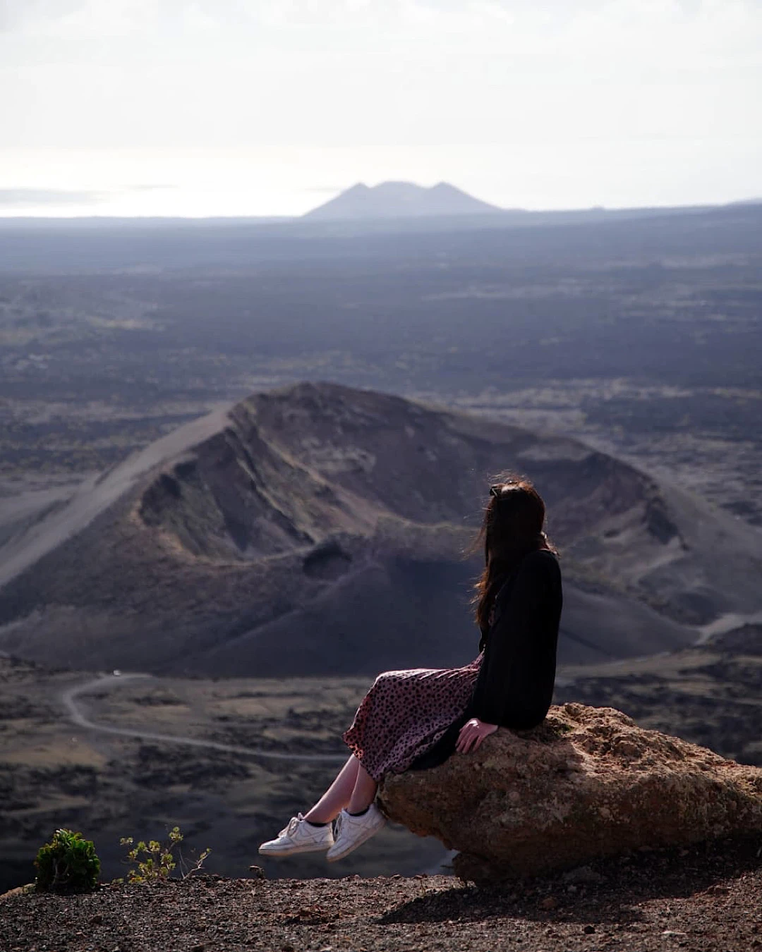 Panoramic view from the Montaña Negra viewpoint over the volcanic landscape of Lanzarote.